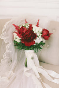 Hannah & Daniel: Manor Wedding, bouquet sitting in a chair